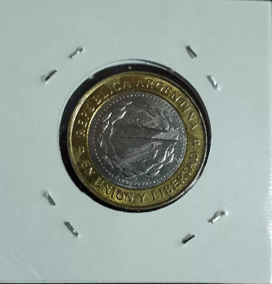 moneda rayada