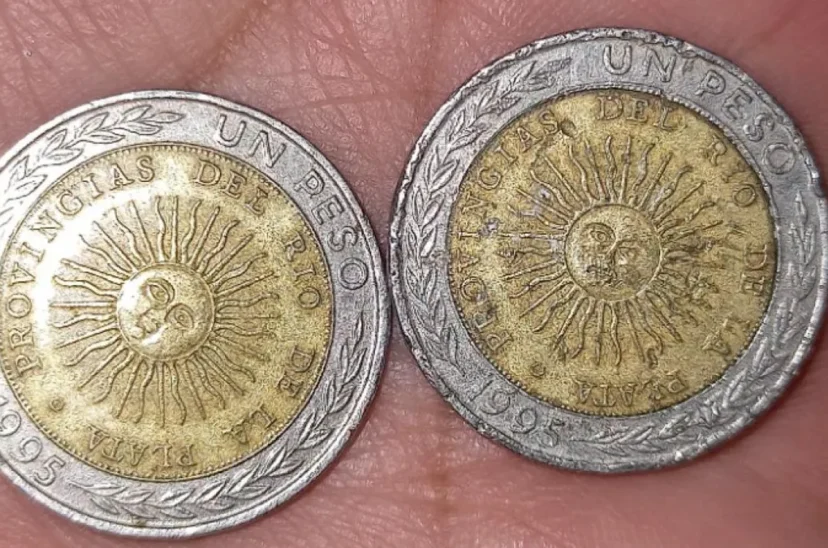 moneda $1